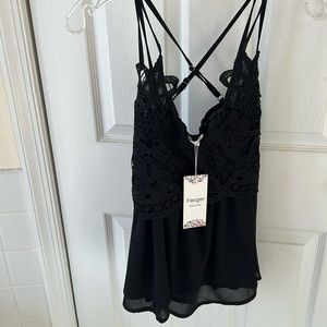 Babydoll top by Feager size small